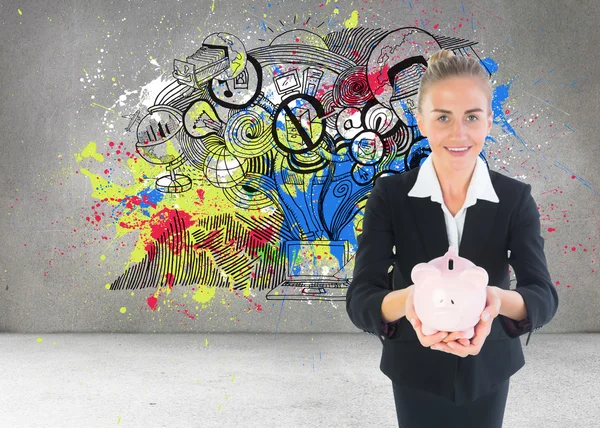 Samengestelde afbeelding van zakenvrouw houden van roze piggy bank — Stockfoto