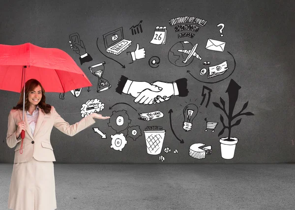 Happy businesswoman holding umbrella — Stock Photo, Image