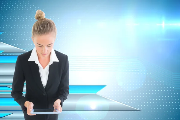 Composite image of businesswoman holding new tablet — Stock Photo, Image