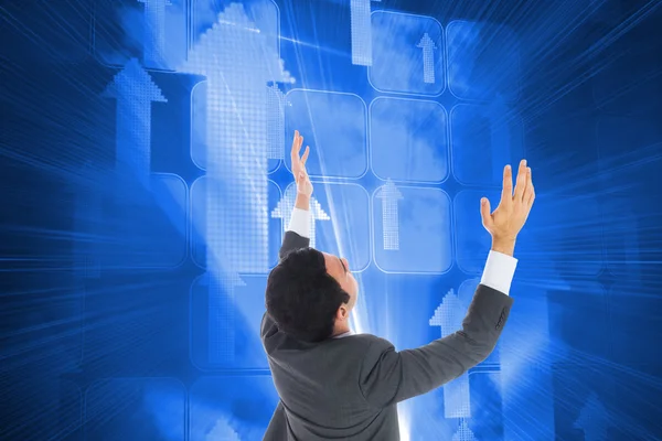 Composite image of businessman with arms raised — Stock Photo, Image