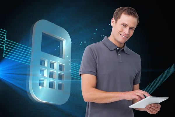 Smiling young man with tablet computer — Stock Photo, Image