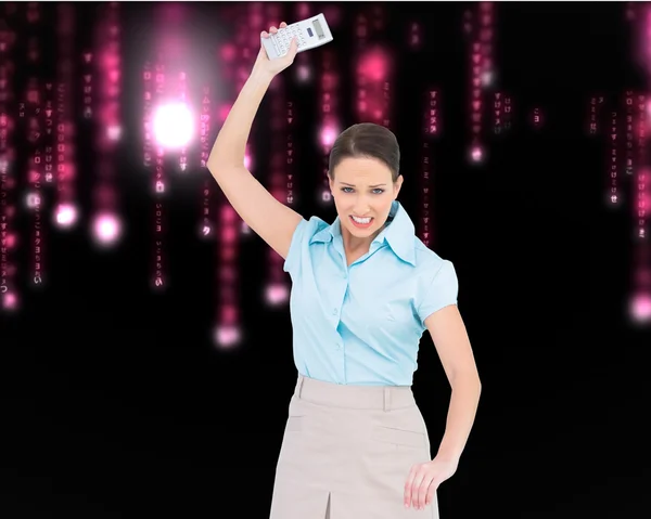 Furious classy businesswoman throwing her calculator — Stock Photo, Image