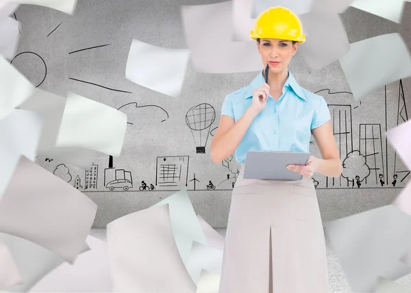 Thoughtful attractive architect holding clipboard — Stock Photo, Image