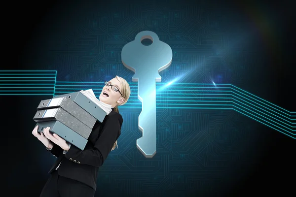 Composite image of businesswoman carrying folders — Stock Photo, Image