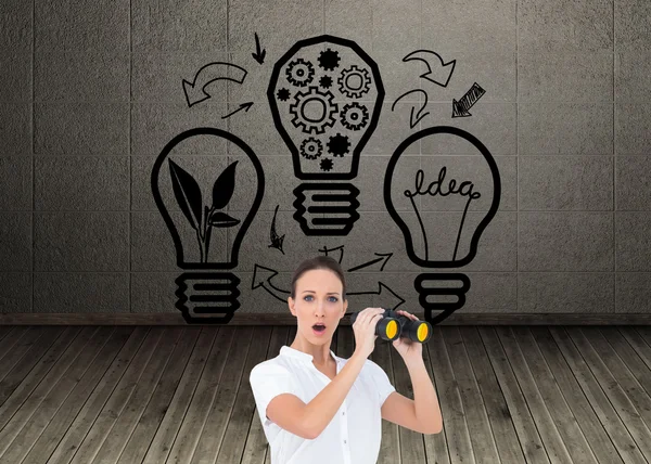 Composite image of astonished elegant businesswoman holding binoculars — Stock Photo, Image