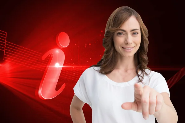 Composite image of attractive brunette pointing — Stock Photo, Image
