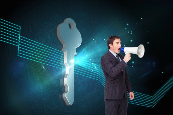 Businessman shouting through a megaphone — Stock Photo, Image