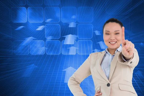 Compuesto imagen de sonriente asiática mujer de negocios señalando — Foto de Stock