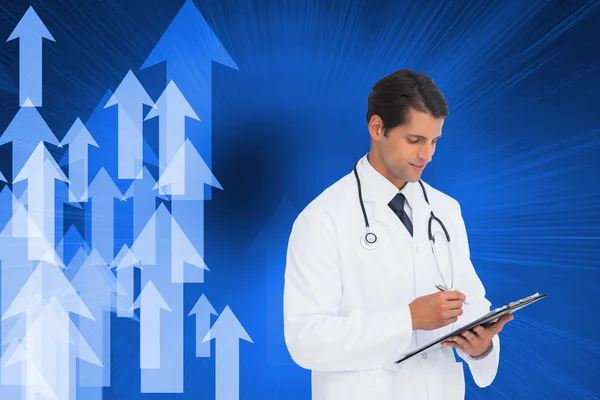 Doctor holding pen and clipboard — Stock Photo, Image