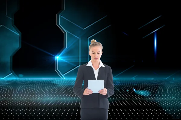 Composite image of businesswoman holding new tablet — Stock Photo, Image