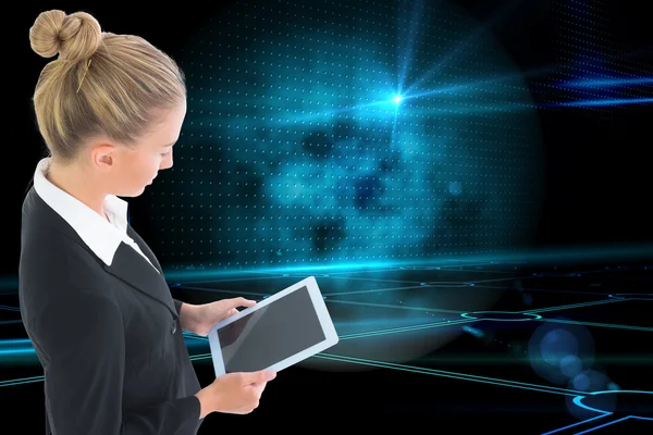 Composite image of businesswoman holding tablet — Stock Photo, Image