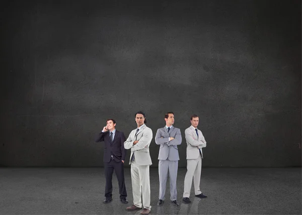 Businessmen standing arms crossed — Stock Photo, Image