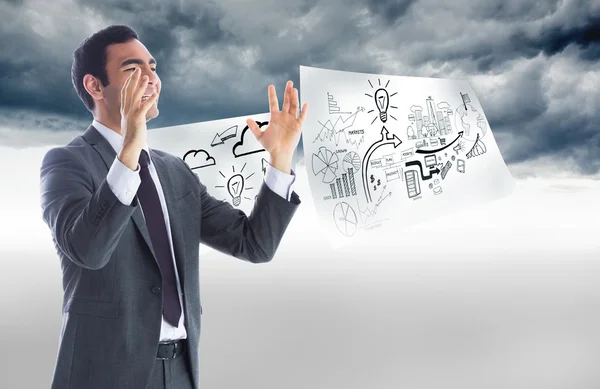 Composite image of stressed businessman with arms raised — Stock Photo, Image