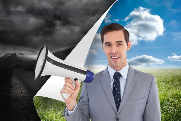 Businessman holding a megaphone — Stock Photo, Image