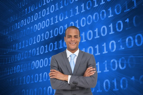 Charismatic young businessman with arms crossed — Stock Photo, Image