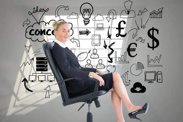 Composite image of businesswoman sitting on swivel chair in black suit — Stock Photo, Image