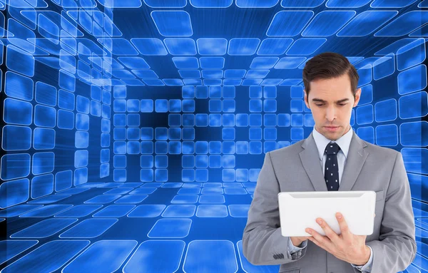 Businessman holding a tablet computer — Stock Photo, Image