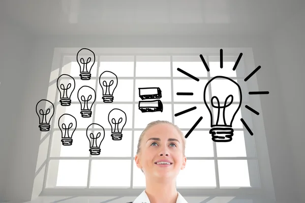 Composite image of businesswoman holding tablet — Stock Photo, Image