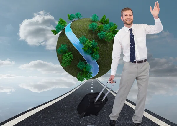 Handsome businessman with suitcase waving — Stock Photo, Image