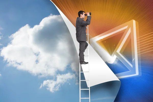 Composite image of businessman standing on ladder using binoculars — Stock Photo, Image