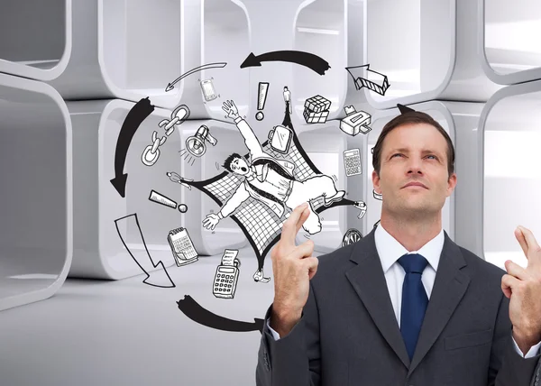 Businessman with fingers crossed is looking up — Stock Photo, Image