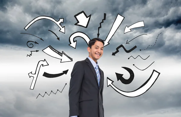 Composite image of smiling asian businessman — Stock Photo, Image