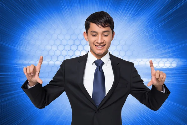 Composite image of smiling businessman holding — Stock Photo, Image