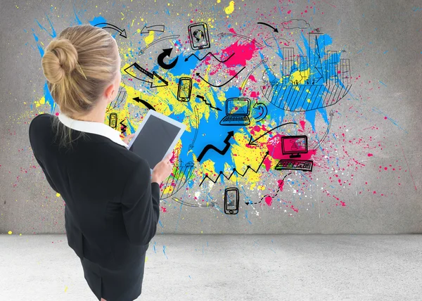 Composite image of businesswoman holding new tablet — Stock Photo, Image