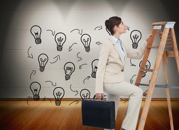 Businesswoman climbing career ladder with briefcase — Stock Photo, Image