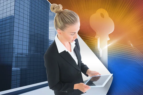 Composite image of businesswoman holding new tablet — Stock Photo, Image
