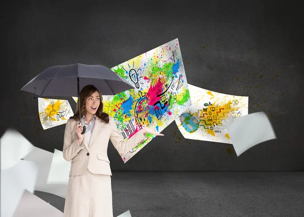 Elegant businesswoman holding black umbrella — Stock Photo, Image