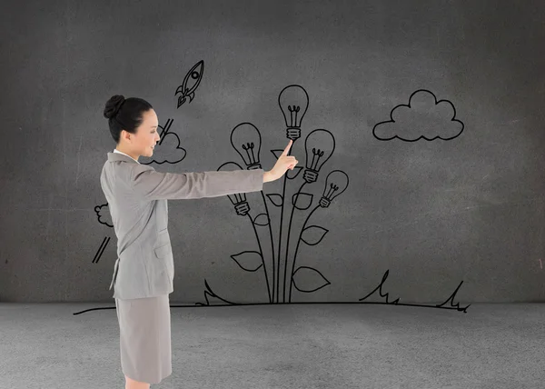 Smiling asian businesswoman pointing — Stock Photo, Image