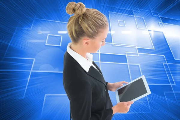 Composite image of businesswoman holding tablet — Stock Photo, Image