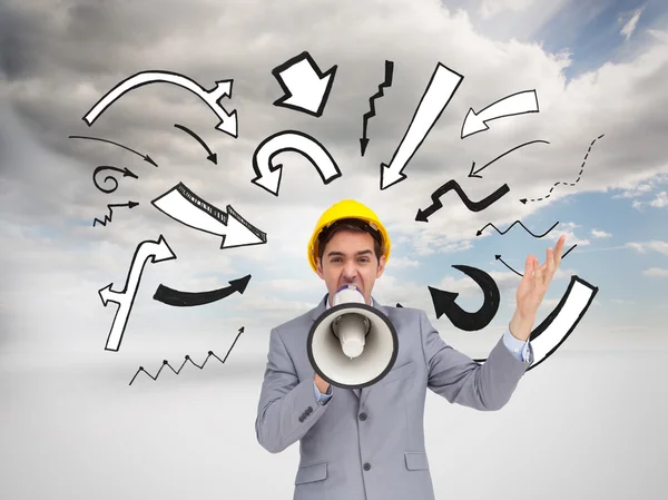 Architect with hard hat shouting with a megaphone — Stock Photo, Image