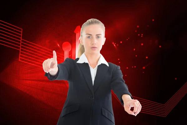 Composite image of businesswoman pointing somewhere — Stock Photo, Image