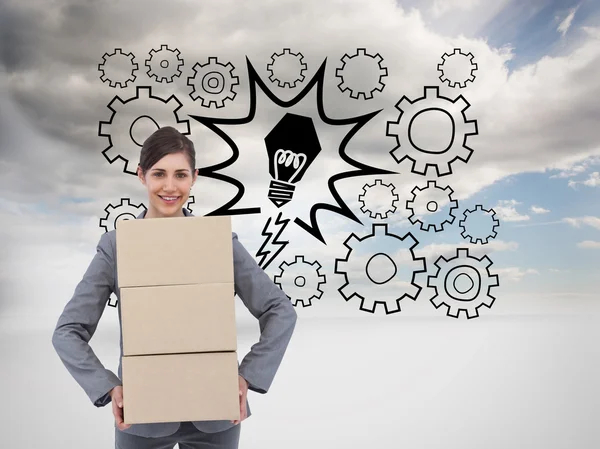 Businesswoman carrying cardboard boxes — Stock Photo, Image