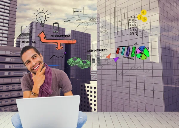 Man sitting on floor using laptop — Stock Photo, Image