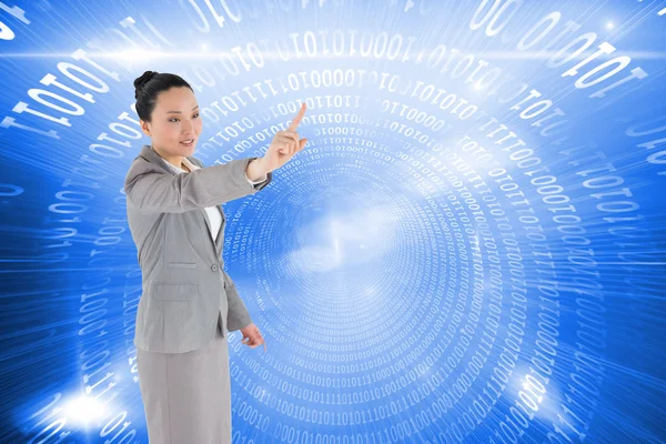 Compuesto imagen de sonriente asiática mujer de negocios señalando — Foto de Stock