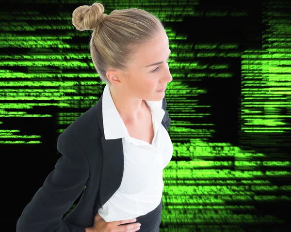 Composite image of businesswoman standing with hands on hips — Stock Photo, Image