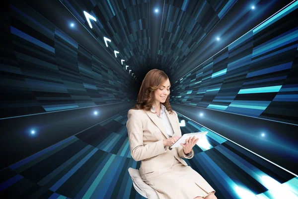 Composite image of happy businesswoman using tablet — Stock Photo, Image