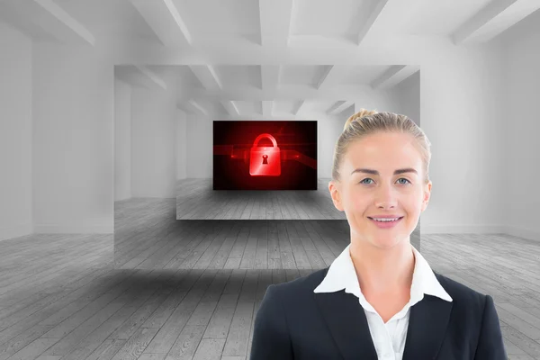 Composite image of businesswoman holding tablet — Stock Photo, Image