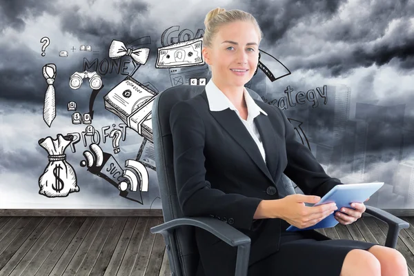 Composite image of businesswoman sitting on swivel chair with tablet — Stock Photo, Image