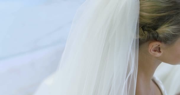 Beautiful bride smiling up at camera — Stock Video