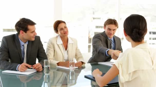 Happy businesswoman being interviewed and offered the job — Stock Video