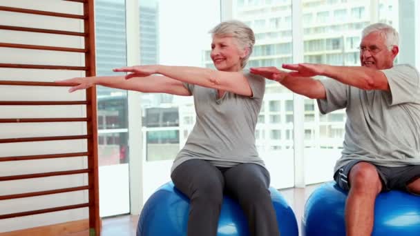 Senior citizens working out Royalty Free Stock Footage