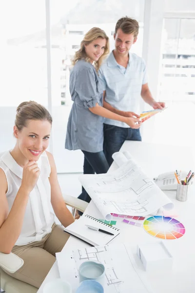 Group of artists working on designs — Stock Photo, Image