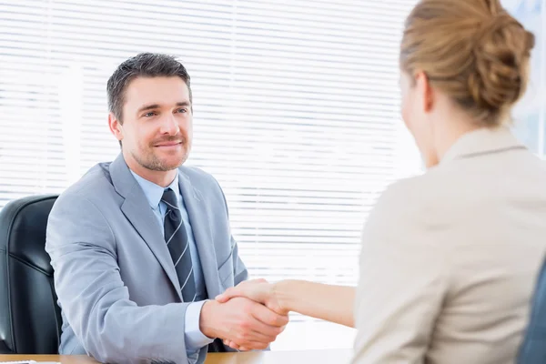 Executives shaking hands after a business meeting — Stock Photo, Image