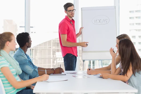 Casual business people in office at presentation — Stock Photo, Image