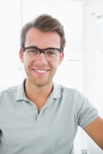 Portrait of a casual male photo editor smiling — Stock Photo, Image