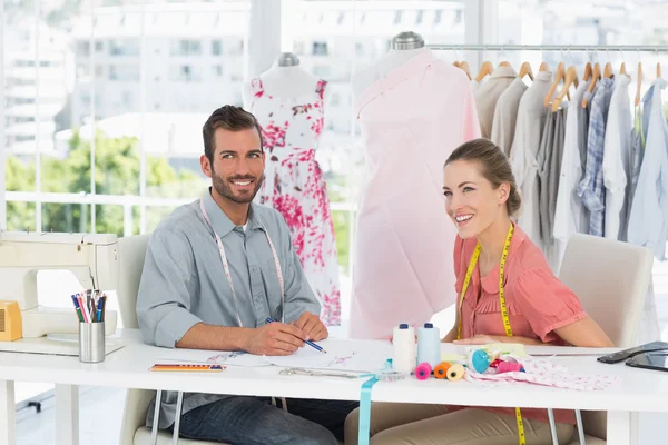 Fashion designers at work in bright studio — Stock Photo, Image